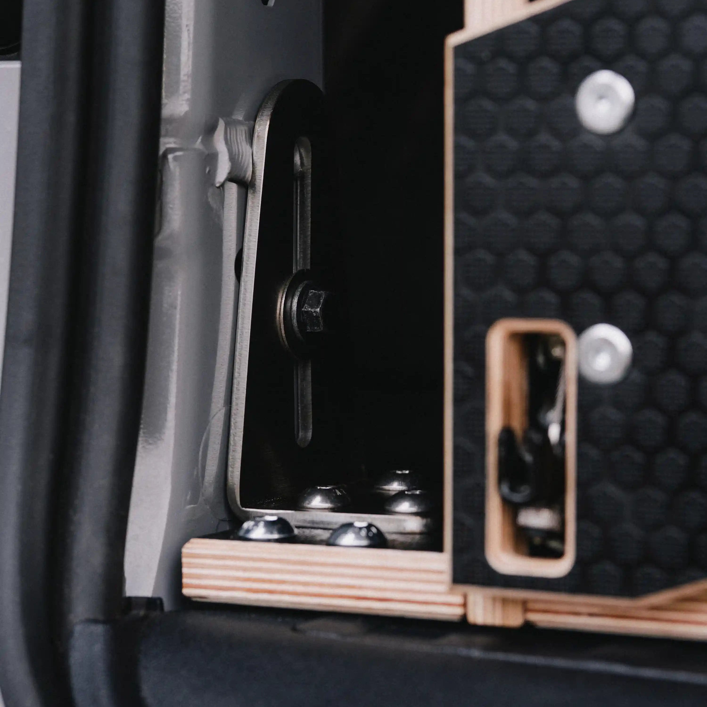 Close up of Ovano's stainless steel mounting brackets for T7 and Transit Custom.