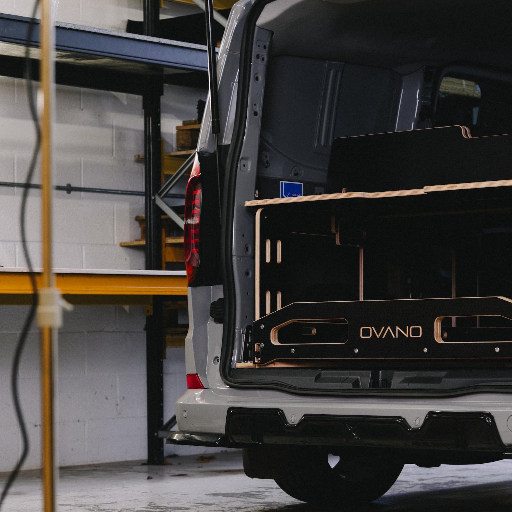 Ovano Switch fitted in rear of Transit Custom panel van. Shot from rear of van.