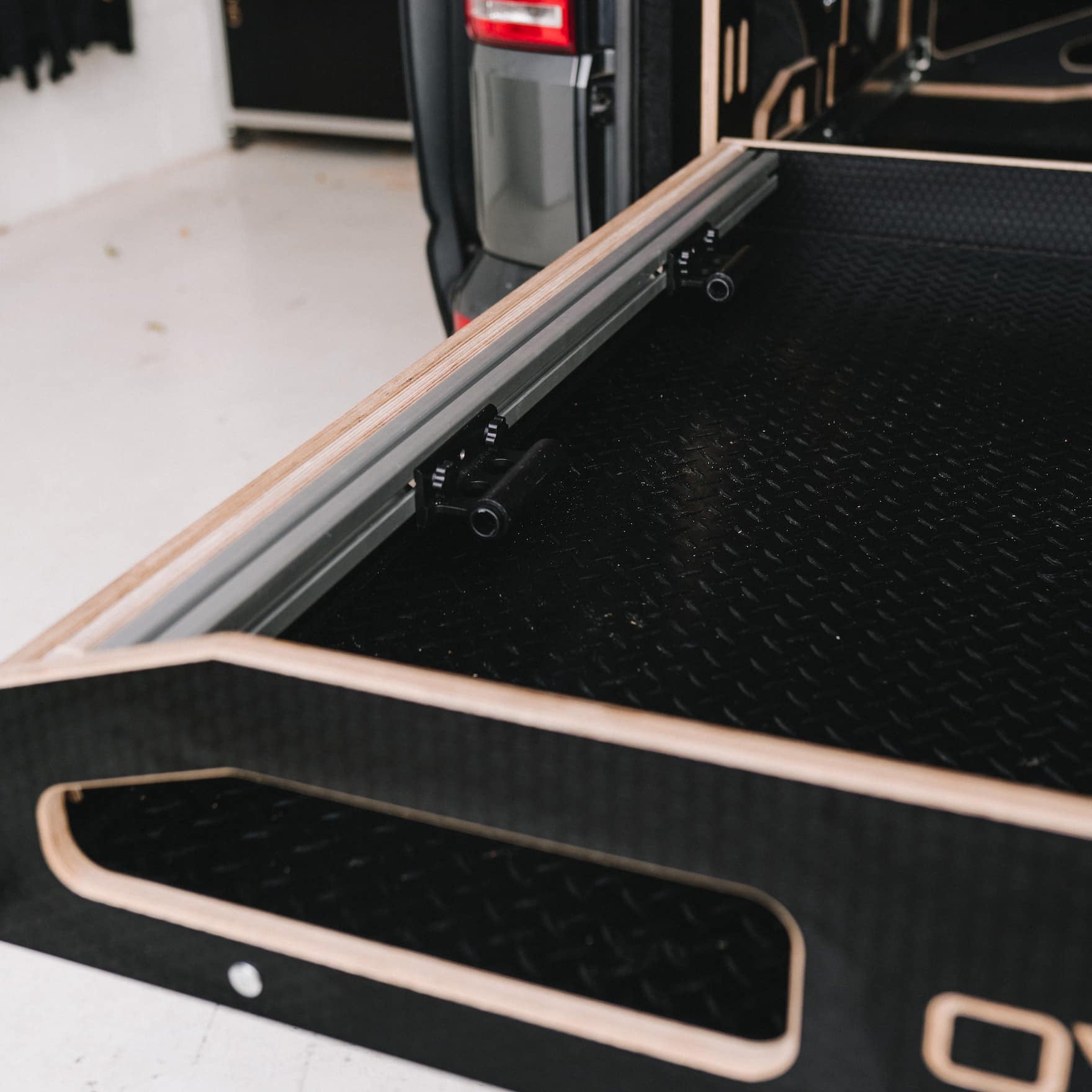 bike bar with 2 x fork mounts fitted being stowed on Ovano Switch Xl drawer side