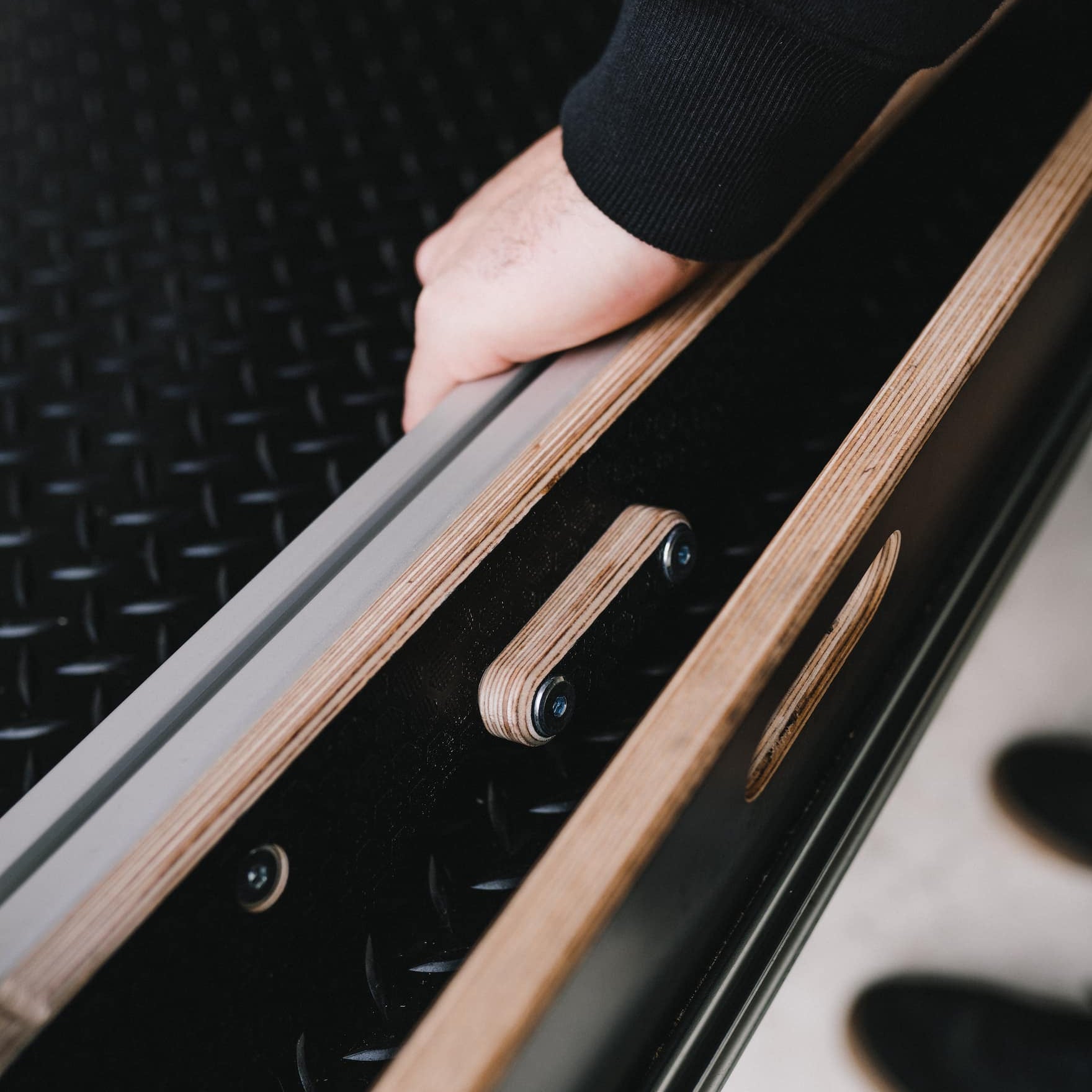 close-up of bike bar being stowed in its unused position.