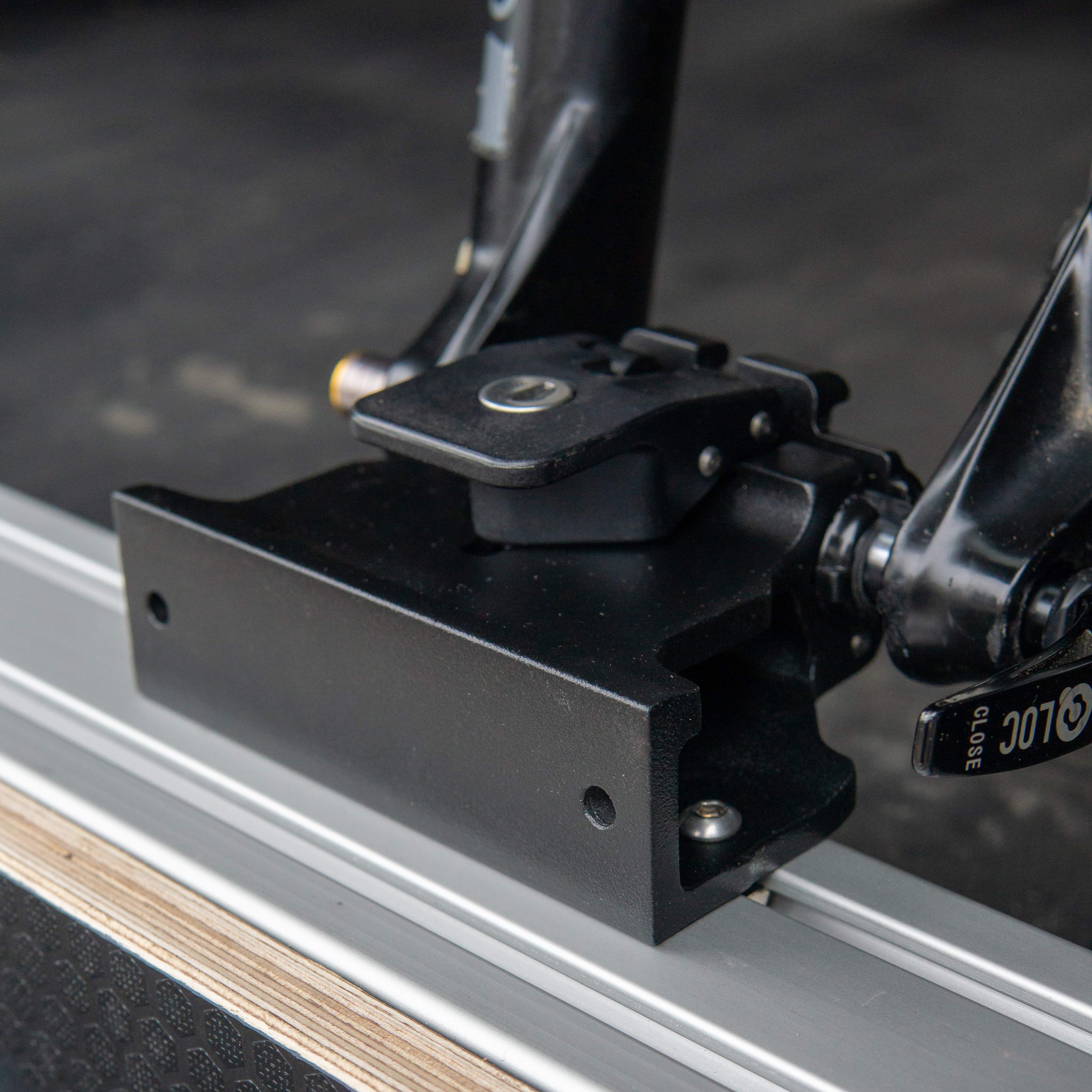 Thru axle fork mount mounted on its back on aluminium channel in a van