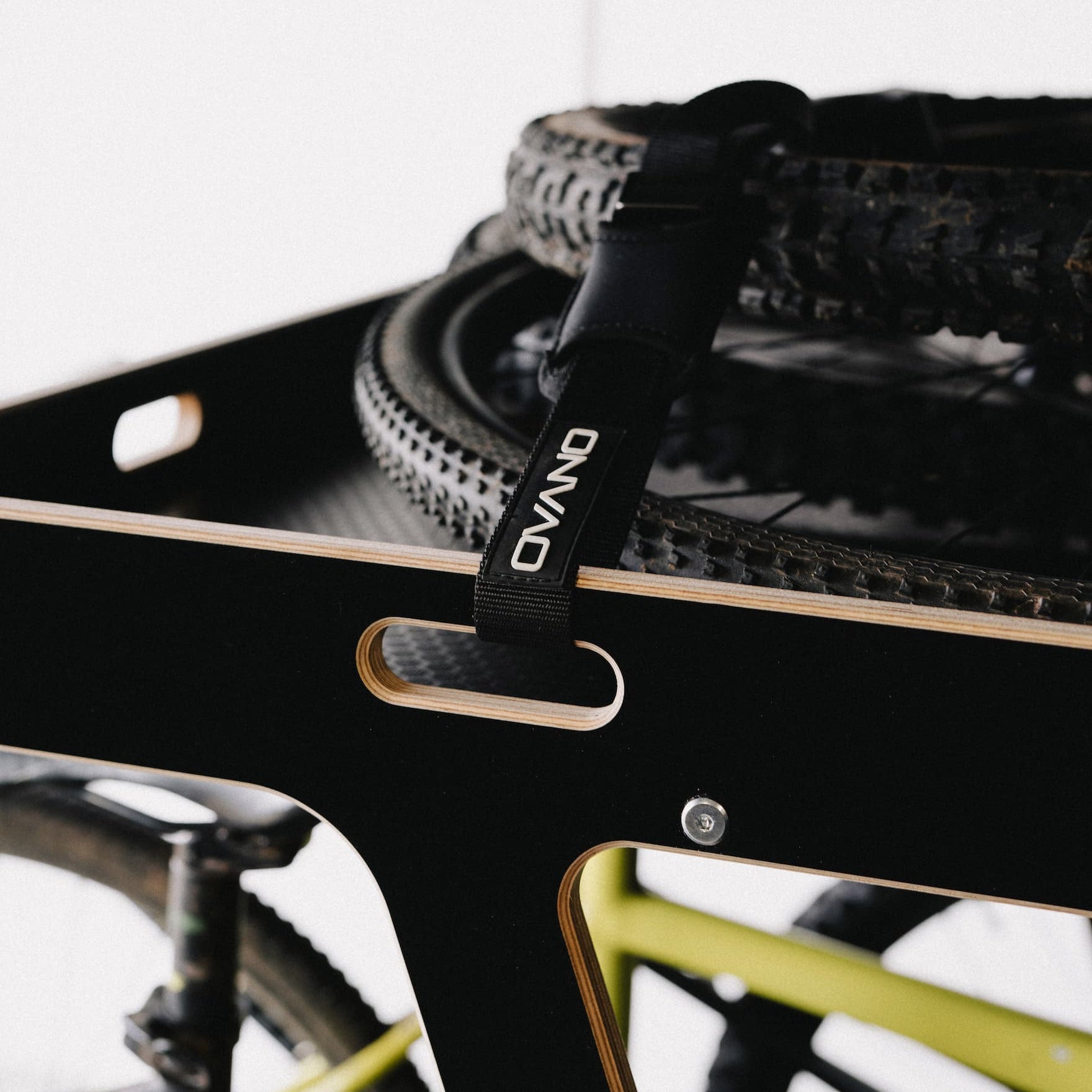 close up of Ovano bike tray top shelf, strapping MTB wheels down