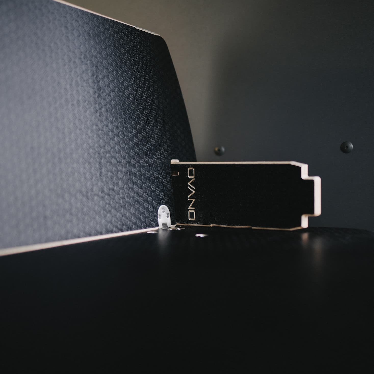 Ovano leg support shown stored through mini bulkhead in Switch XL