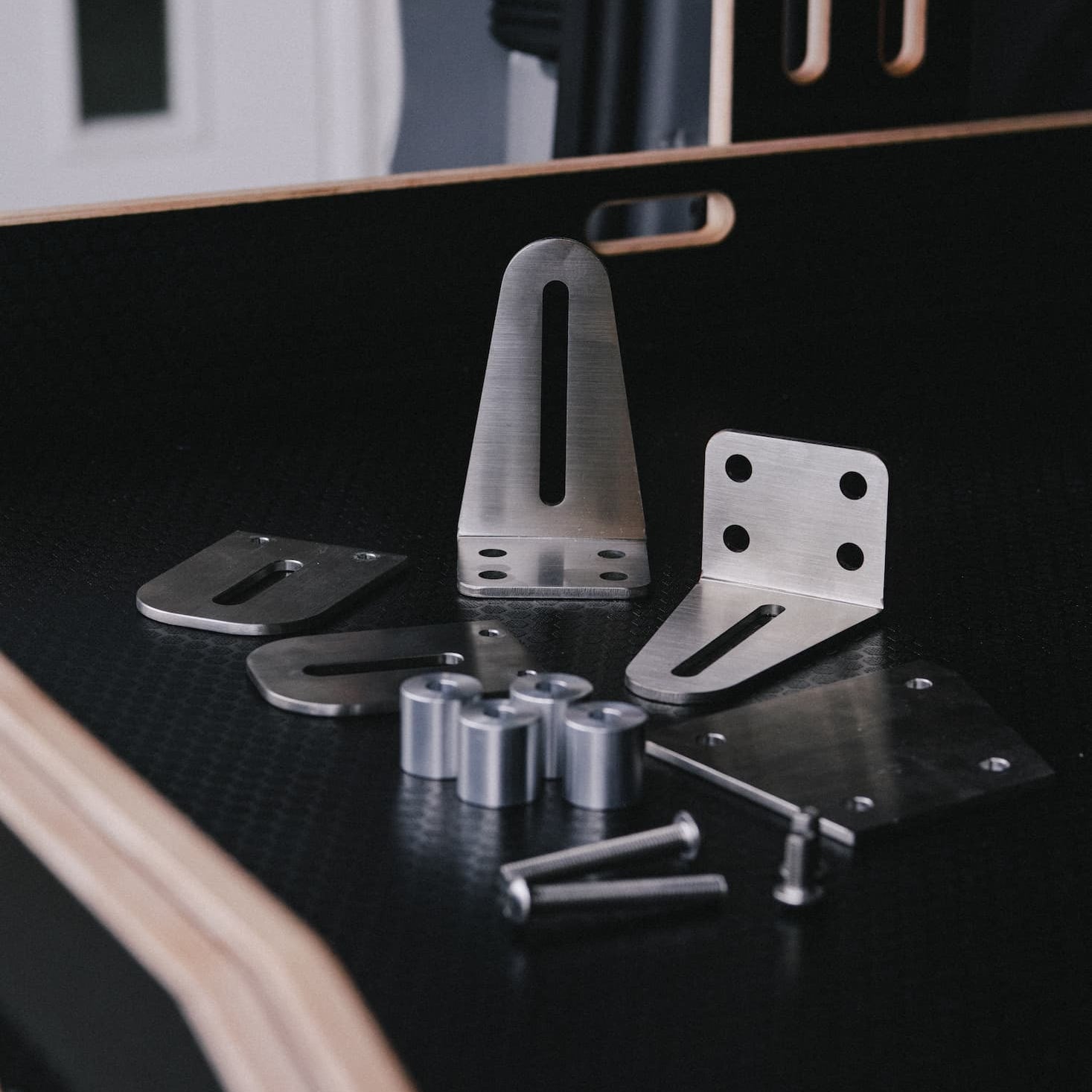 Stainless steel brackets and hardware in an ovano drawer system