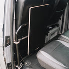 Camper van table stored inside a Transporter van, not in use