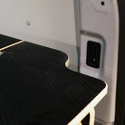 Ovano dual deck rear flap shown with cutout for allow for access to light switch. Grey van.