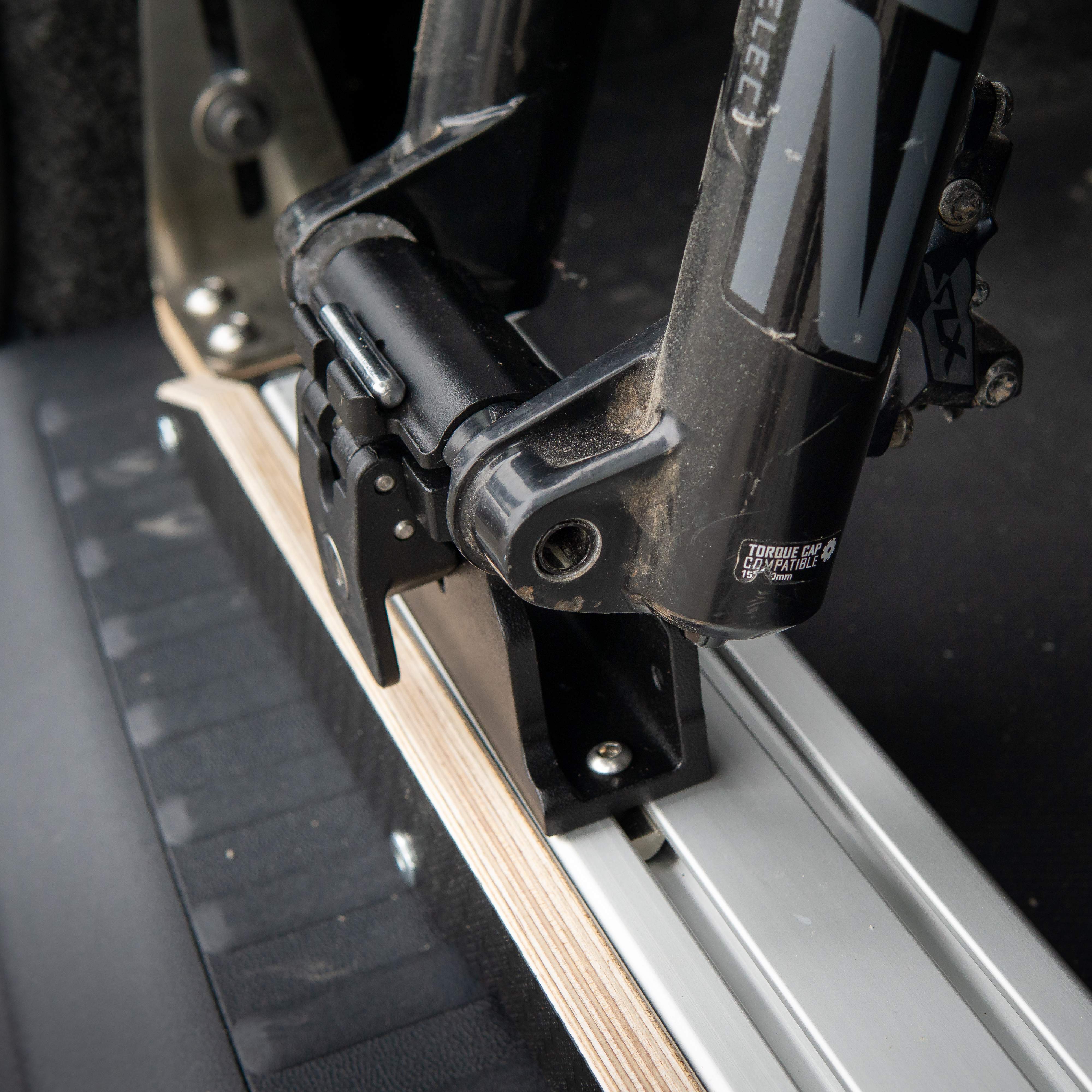 mountain bike shown attached to Ovano fork mount in a van