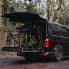 LWB Kombi carrying 3x MTB in a sliding bike tray.