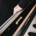 close-up of bike bar being stowed in its unused position.