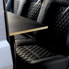 Ovano B-pillar table viewed through  the side door of VW Transporter Kombi.
