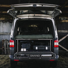 Ovano switch xl bed bulkhead and drawer system in a T5.1 parked in a barn