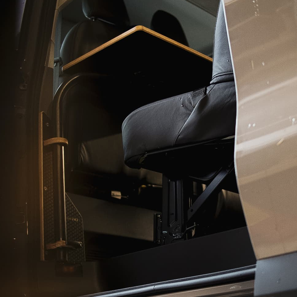 passenger side ovano table installed in a kombi from floor level perspective